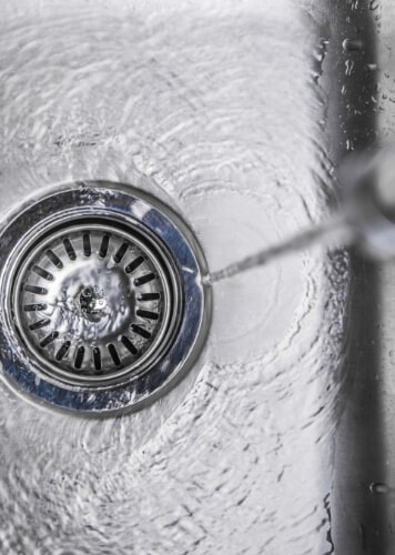 close-up-drain-with-running-water